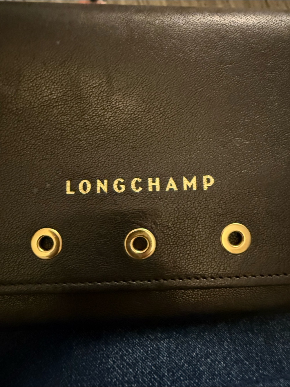 Longchamp Black Leather Wallet with Gold Detailing